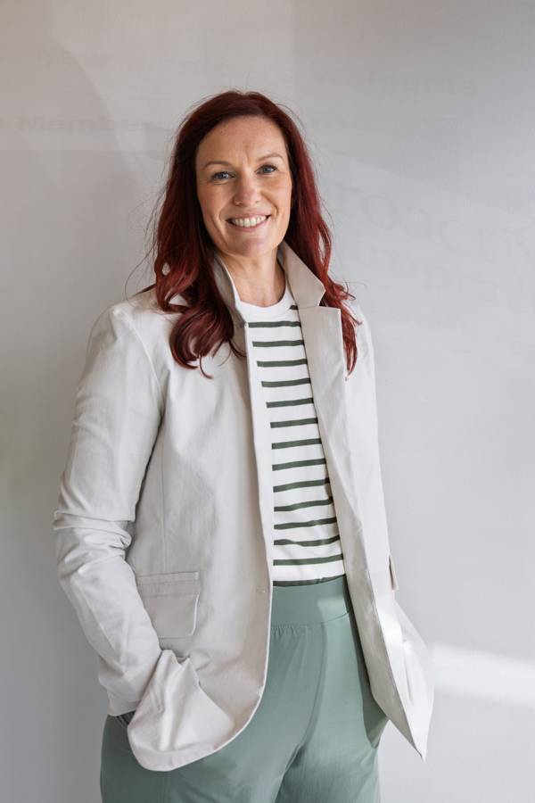 Dr. Sarah Simison smiling in the clinic